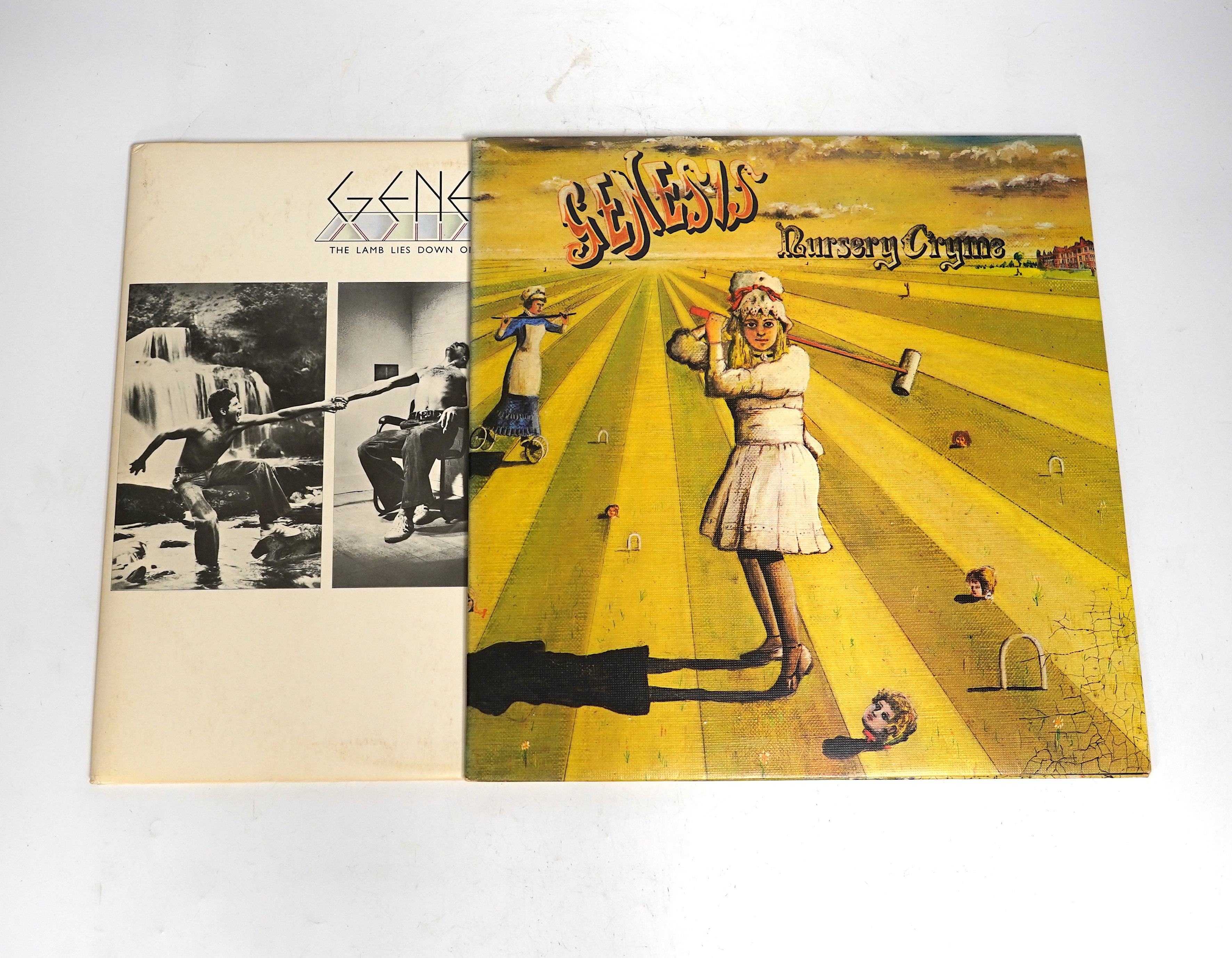 Two Genesis LP record albums; Nursery Cryme on pink Charisma label CAS.1052, with textured cover, and The Lamb Lies Down on Broadway on Charisma label CGS101, ‘Marketed by B&C Records’